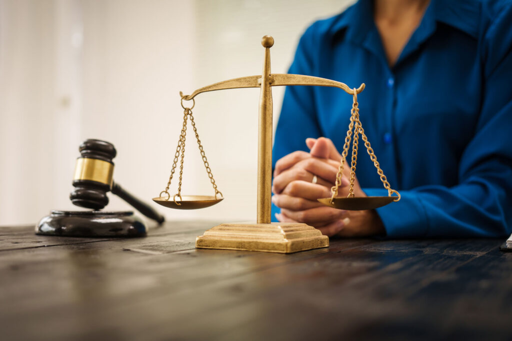 an asian female lawyer sits her desk office workin 2026 01 08 07 53 26 utc