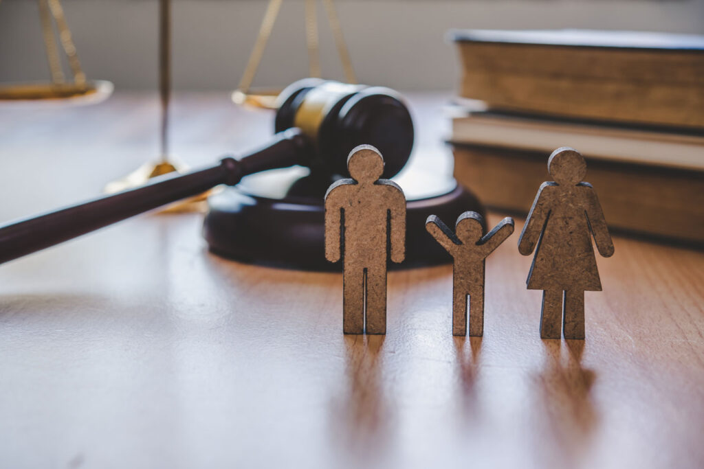 family law concept with wooden figures and gavel 2026 03 19 05 17 20 utc