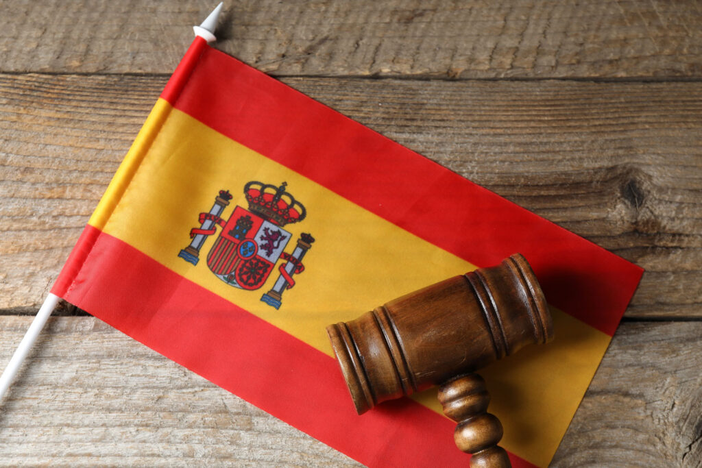 wooden judge s gavel resting on a spanish national 2026 05 07 20 14 46 utc